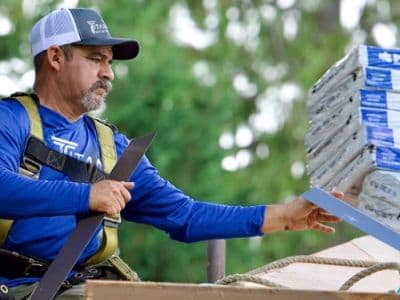 Titan crew installing an architectural shingle roof